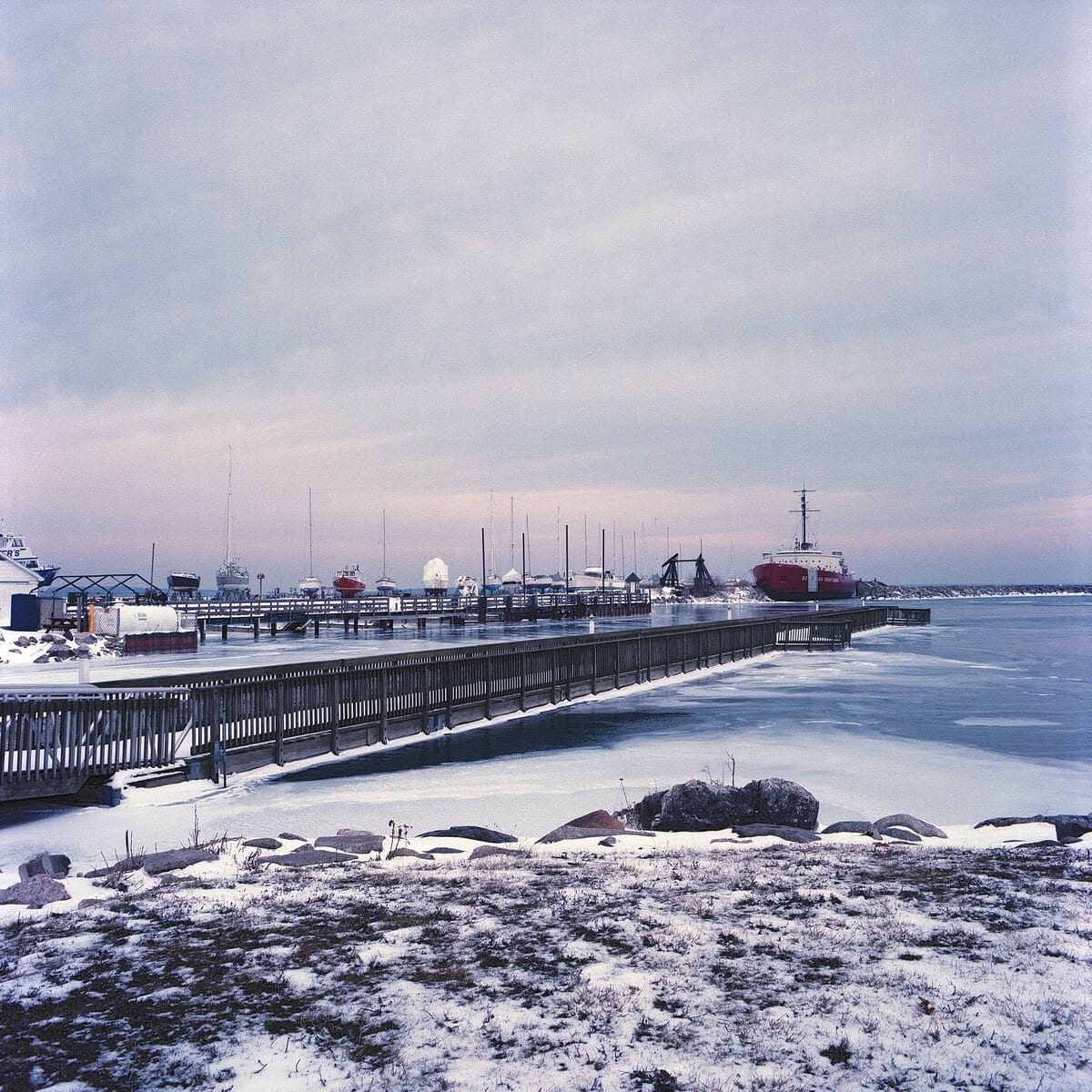 Ships at a frozen harbor on film